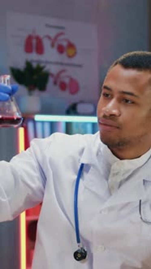 Close Up Portrait of Handsome Concentrated Purposeful Qualified African American Man Researcher in