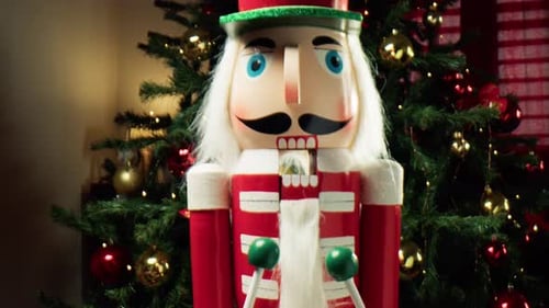 Christmas Nutcracker In Front of a Festive Tree