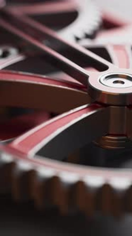 Schleife rotierender Metallzahnräder in Bewegung.