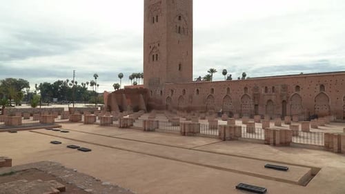 Intricate tilework and Arabic calligraphy adorn the walls of Koutoubia Mosque in Marrakech, showcasi