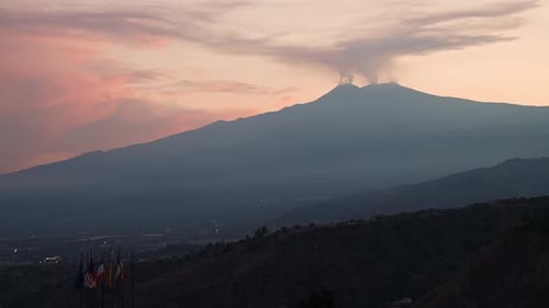Scenic View of Smoke Emitting From Volcanic Mount Etna with Sky in Background