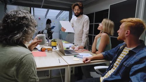 Team of Professional Business People Meeting in the Office Conference Room