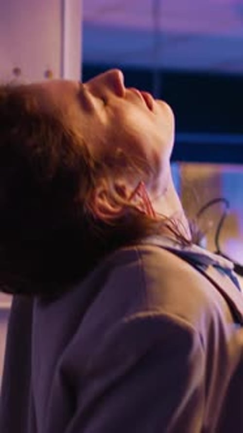 Vertical Video Company Worker Taking Break to Stretch Back in Office