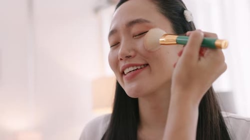 Bridesmaid Helping Bride Get Ready for Wedding