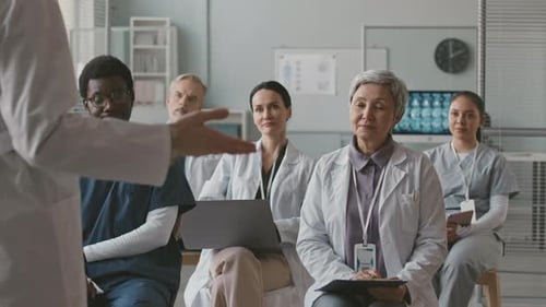 Medical Professionals Attending a Healthcare Lecture