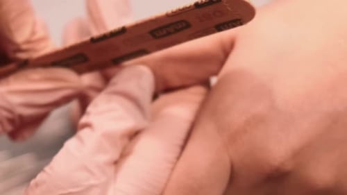 Applying Artificial Nails and Shaping with Nail File