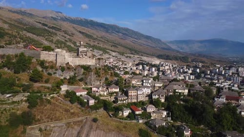 Aerial drone view of the old castle and fortress of the city of Gjirokaster or gjirokastra, Albania.