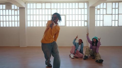 Energetic Man Dancing in an Urban Dance Studio