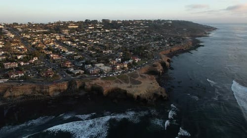 Aerial view of San Diego Cliffs, California USA upscale residential neighborhood at sunset, drone sh
