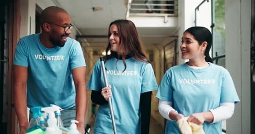 Charity, volunteer people and walking for cleaning in building with community service