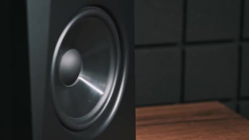 Studio Monitor Speaker Vibrates From Bass Music in a Recording Studio CloseUp