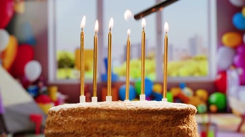 Woman Kid Child Blowing Candles on Birthday Cake Macro Close Up of Some Unlit Candles and Just One