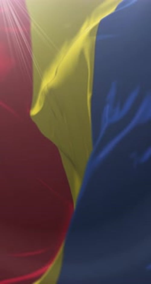 Vertical Waving Romanian Flag with Sunlight and Lens Flare