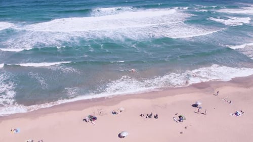 Stunining Drone View Waves Crashing at Beach with People in Bulgaria Sea Water Surface Texture
