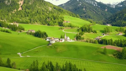 Spring Sunny Landscape of Alpine Meadow in Dolomites Alps Famous Santa Maddalena Village with Church