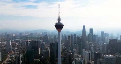 Telecommunication KL Tower In The City Of Kuala Lumpur, Malaysia. Aerial Drone Shot