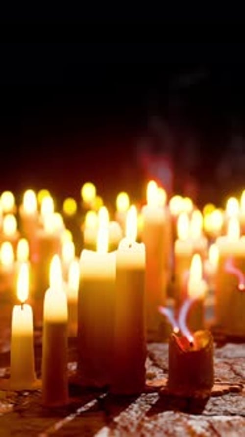 Flickering Candles Light for Remembrance and Spiritual Reflection