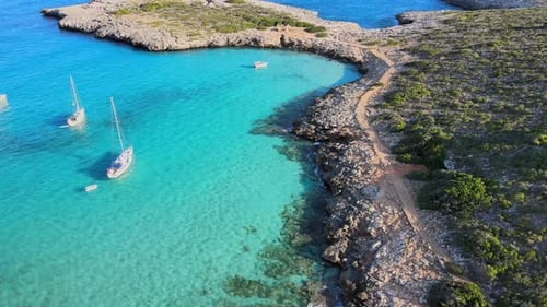 Explore the stunning coastline of Cala Varques in Majorca with beautiful turquoise waters