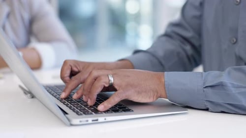 Hands, laptop typing and business person with web research, technology and email in a office