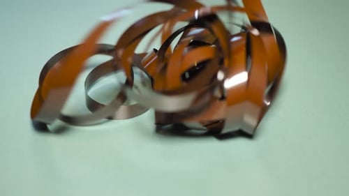 Tape Unreel. Pulling the tape out. Destroying cassette tape media. Scene H.