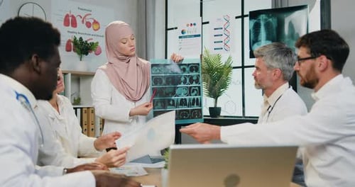 Man and woman team of doctors having joint meeting in clinic office. Medicine and healthcare concept