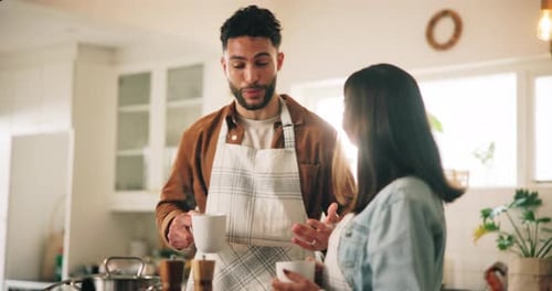 Couple Enjoying Coffee Together in Bright Kitchen