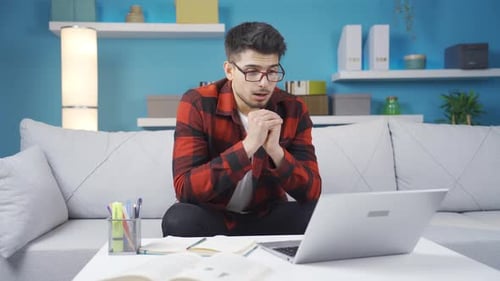 The young man who eagerly awaits good news is frustrated.