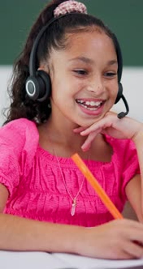 Enthusiastic Girl Attends Online Class in School