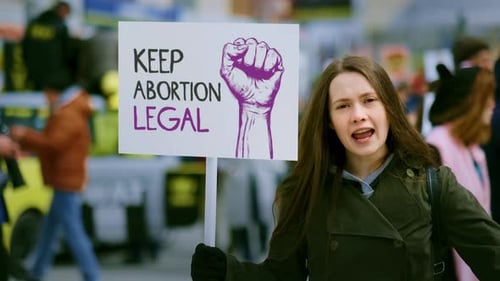 Young Woman Protesting For Abortion Rights in City