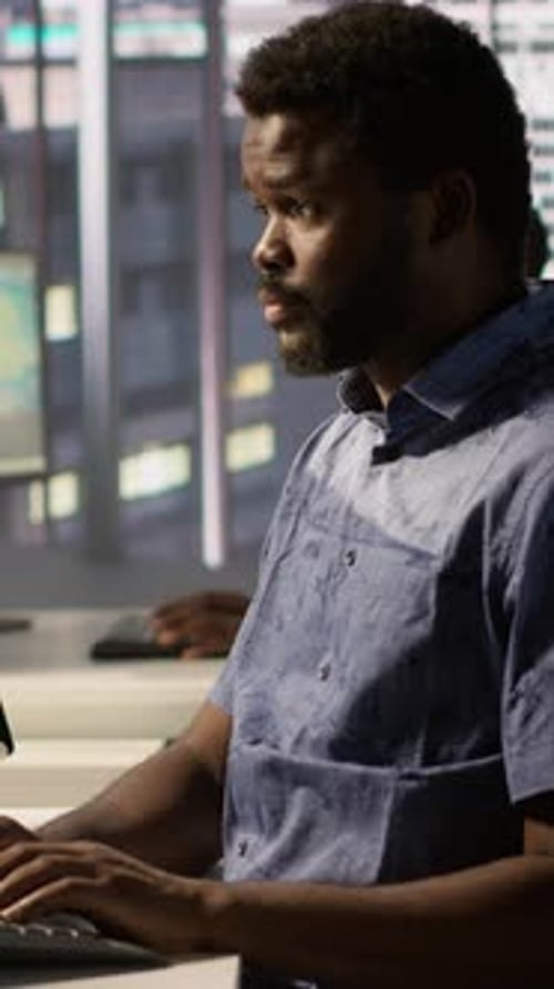 Vertical Video IT Professional Working with AI Tech to Transform Data Into Predictive Models