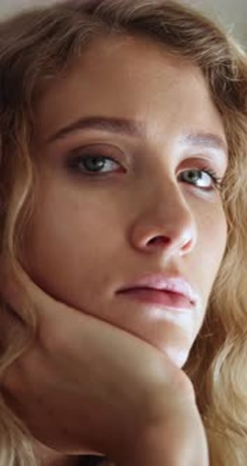 Woman, face and sad in home thinking alone of memory or depressed of stress or overwhelmed