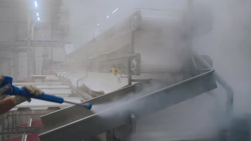 Pressure Washing of the Conveyor in the Production Shop Industrial Cleaning