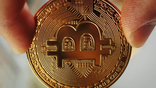 Golden Bitcoin Cryptocurrency Close Up