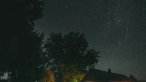 Starry Night Sky Time Lapse Over Rural Home