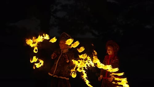 Ritual Dance With Fire Professional Stuntwomen In Traditional Gown Performing Tricks With Fire