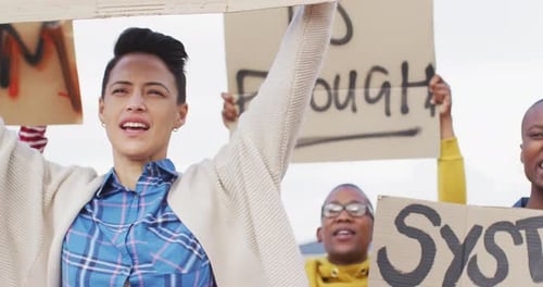 Adults Protesting with Signs Outdoors in Daylight