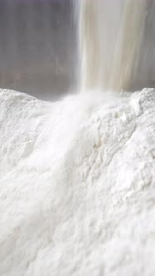 Falling White Powder Material at the Workplace