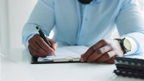 Writing, hands and paper work with a man applying for finance, a home loan