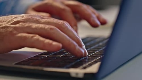 Guy Fingers Typing Laptop Keyboard Sitting Cabinet Closeup Copywriter Texting