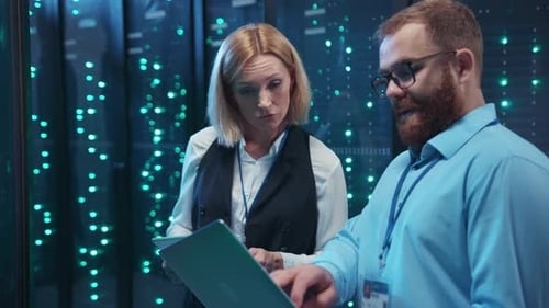 IT professionals working in server data center