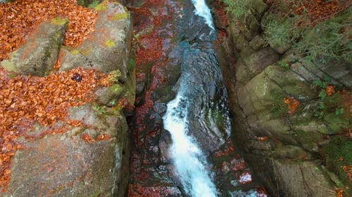 Mountain River And Waterfall