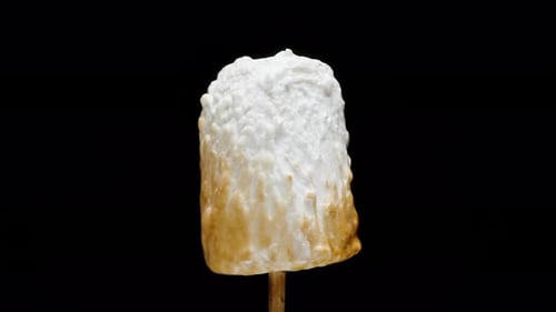 Close Up of Toasted Marshmallow on Black Background