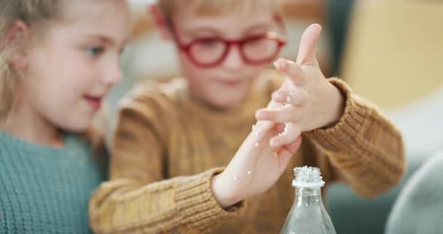 Kids Doing Science Experiment Together at Home