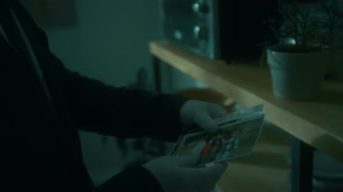 Man Wearing Gloves Reviews Photographs Indoors