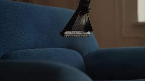 Couch Cleaning With Water Spray Nozzle Close Up