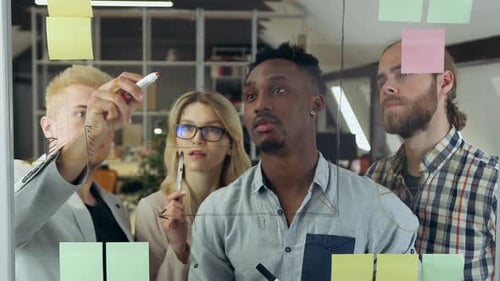 Team of Professionals Brainstorming Ideas in Office