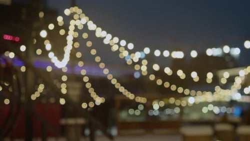 Winter Night Street With Christmas Lights And Star Garlands
