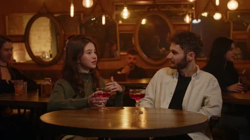 Two Strangers Mets at Bar and Flirting When Drinks Alcohol Cheers Let's Drink for This Beautiful