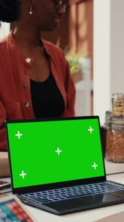 Woman Gets Groceries With Green Screen Laptop