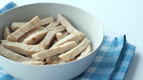 Bowl of Cut Cooked White Meat Pieces